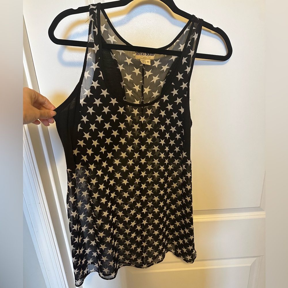 Royal Bones Black Star Print Women's sheer racerback tank. Flattering